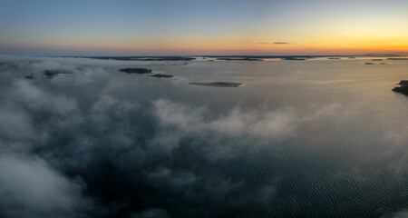aerial panorama view of a beautiful sunset over the skerries and islands of the Aland archipelago in the Baltic Sea