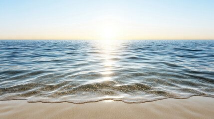 Sunrise ocean horizon calm water gentle waves reflecting warm light