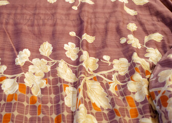 Close up red floral blanket design