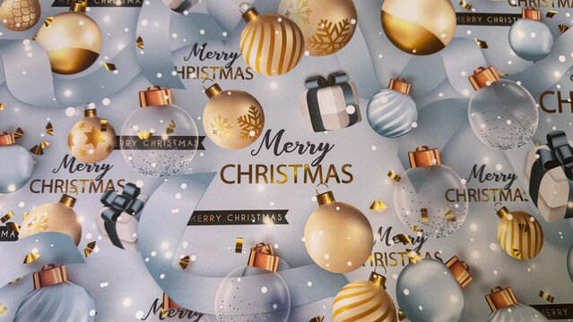A festive Christmas background with gold and blue ornaments, gift boxes, confetti, and &ldquo;Merry Christmas&rdquo; text on a soft winter backdrop, perfect for holiday designs