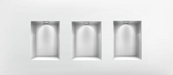 Empty white wall niches with led spotlights and shadow depth in 3d room interior. Blank shelf boxes illuminated by ceiling light for museum gallery exhibition or retail product display frame mockup.