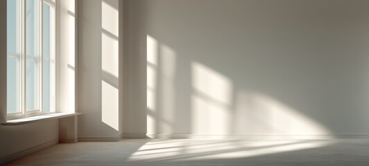 Obraz premium Soft Diffused Window Light on Minimal Interior Wall with Bright Calm Tones and Large Negative Space for Clean Commercial Layout