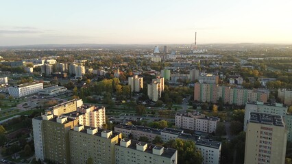 Fototapeta premium Apartment complex with sunset city backdrop