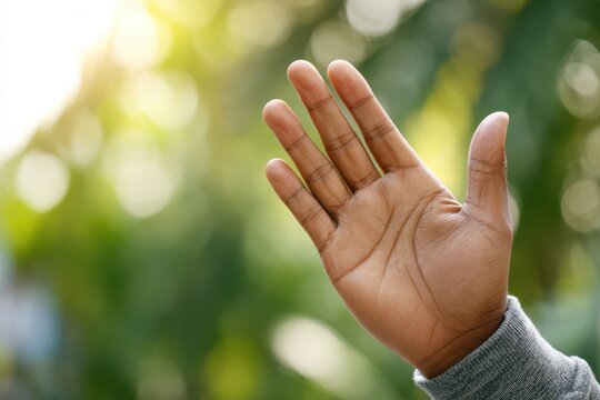 Bright close-up of a welcoming wave against a softly blurred green background - Powered by Adobe