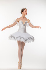 Studio portrait of a ballerina in a white tutu