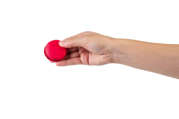 Pink and red macarons in hand on transparent background