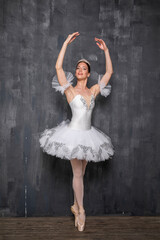 Fototapeta premium Studio portrait of a ballerina in a white tutu