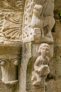Religious stone carving on facade of Santa Cristina de Ribas de Sil Monastery Galicia