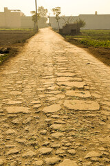 Background texture of dark gray asphalt, top view. Cracked asphalt texture. Road background. Above, high angle. Copy space, empty space, free space. Sstkbackgrounds. flat lay.