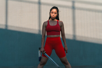 Chinese young woman practicing wushu kung fu.