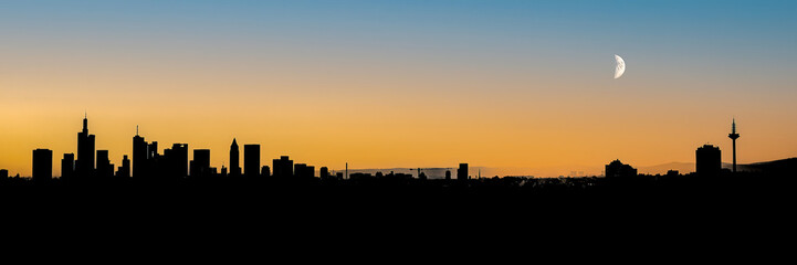 Frankfurt am Main Germany city skyline silhouette crescent moon orange gradient sky with copy space