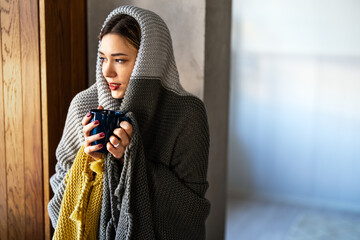 A calm woman enjoying her peaceful morning coffee, embracing slow life and stress-free living