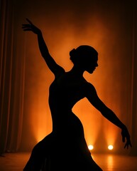 A silhouette of a classical dancer in a dancing pose
