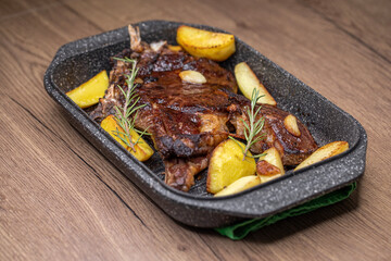 Beef steak on the bone with baked potatoes