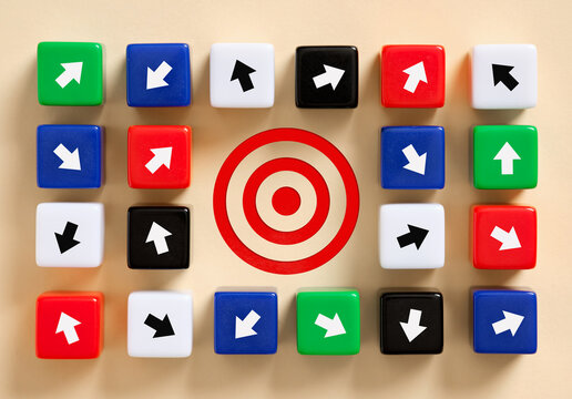 Arrows pointing in different directions around a central target