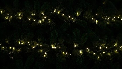 String of warm yellow fairy lights glowing brightly against a dark, almost black background, creating a festive and magical atmosphere, perfect for holiday or celebration themes, 123 characters long