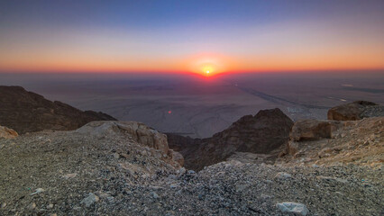 Sunset with rocks timelapse. Jebel Hafeet is a mountain located primarily in the environs of Al Ain