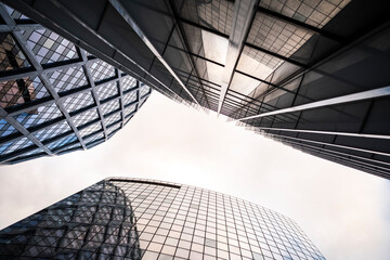 Urban architecture reflecting bold skyscraper design in La Defense as business and finance spaces define Paris, with tower geometry enhancing the skyline and framing the evolving city