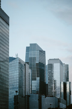 Contemporary architecture and skyscraper lines frame the urban setting of La Defense, highlighting business and finance functions as Paris tower profiles shape the skyline of the city