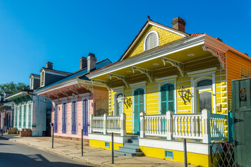 Colorful creole cottages architecture in a street of the French Quarter in New Orleans, Louisiana