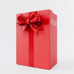 A vertical, matte red rectangular gift box stands tall, beautifully tied with a shiny, deep red satin ribbon and a perfectly shaped bow, ready for a grand reveal.