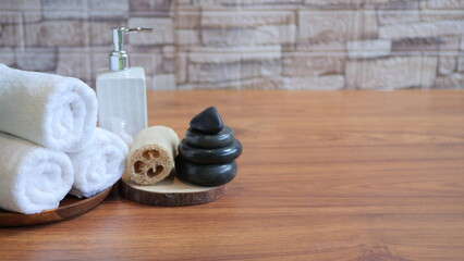 Beautiful composition with spa stones on grey marble table
