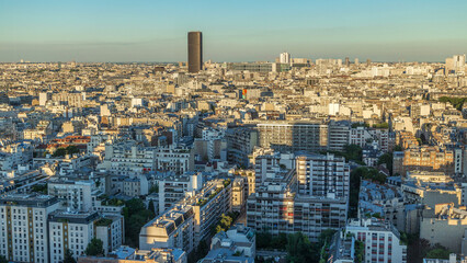 Aerial panorama above many houses rooftops in a Paris timelapse