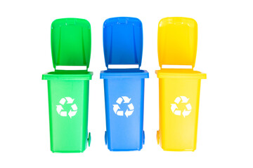Colorful recycling bins — green, blue, and yellow —, symbolizing waste sorting and environmental responsibility.
