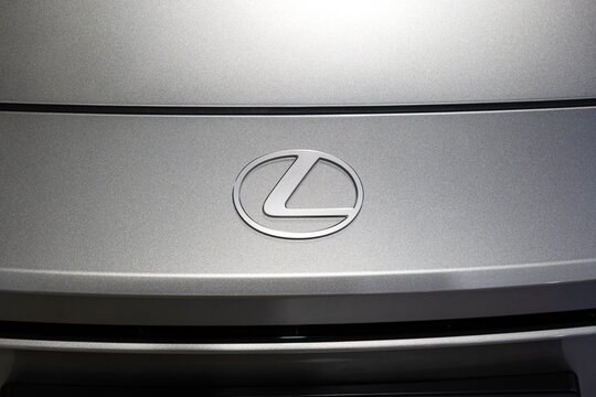 Zurich Auto Show, Switzerland, October 31, 2025. Lexus front bonnet or hood emblem on a car at the Auto Zurich Show. Wide angle, top down, close up shot