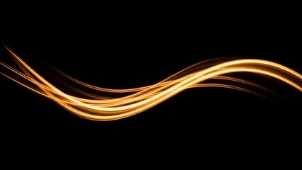 Elegant golden light trails forming a flowing wave on a black background