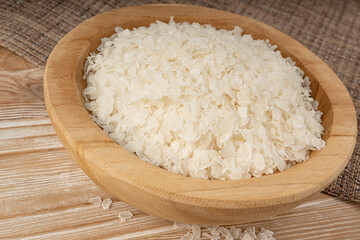 Raw flattened rice. Dry rice flakes or poha, Indian breakfast food
