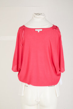Coral pink off the shoulder knitted cropped sweater with short dolman sleeves and elasticated hem