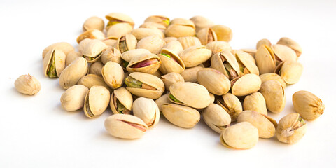 roasted pistachios on white background