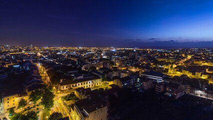 Rooftops of Porto's old town on a warm spring evening timelapse day to night, Porto, Portugal