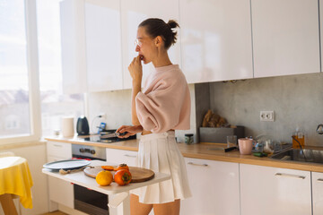 caucasian woman enjoying mindful morning coffee, freelance writer