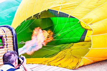 Preparing a hot air balloon to start the flight, heated by hot air