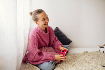 Graceful elderly woman delighting in comfort and digital connection