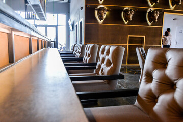 restaurant interior long bar area with seating