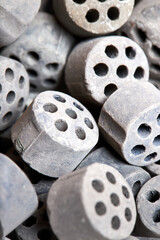 Carbon dioxide reforming of methane nickel catalyst seven holes cylinder pellet form shape methanol synthesis industrial petrochemical selective focus close up vertical shot texture background.