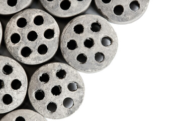 Carbon dioxide reforming of methane. Nickel catalyst seven holes cylinder pellet form shape methanol synthesis industrial petrochemical diagonal view close up shot texture background with copyspace.