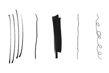 Set of five black handdrawn scribble lines and marks isolated on transparent background