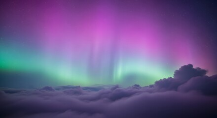 Vibrant green and purple aurora borealis illuminating the night sky above a soft blanket of clouds, creating a magical celestial display.