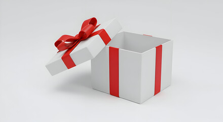 Empty open white gift box with red ribbon and bow. A pristine, opened gift box with a red ribbon and bow, against a plain white backdrop.