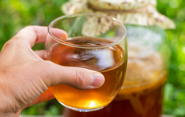 Kombucha in a jar at home. Selective focus.