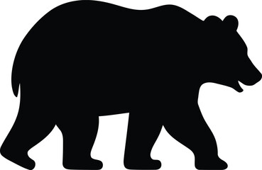 Black silhouette of a large bear walking across flat surface