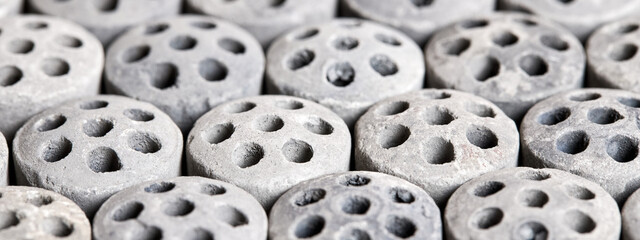 Carbon dioxide reforming of methane nickel catalyst seven holes cylinder pellet form shape methanol synthesis industrial petrochemical selective focus close up shot texture banner background.