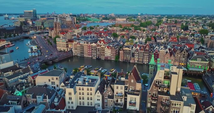 Aerial view of Amsterdam, Netherlands. View of canal and famous places of old centre district, railway station Amsterdam Centraal
