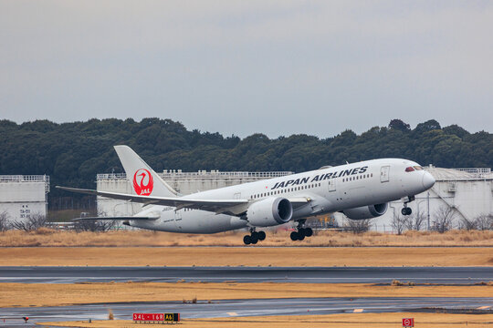 Narita, Chiba Japan - 2025 January 25: Japan Airlines (JAL) Boeing 787-9 Dreamliner (registration JA839J) climbing after takeoff from Narita International Airport against a cloudy sky.