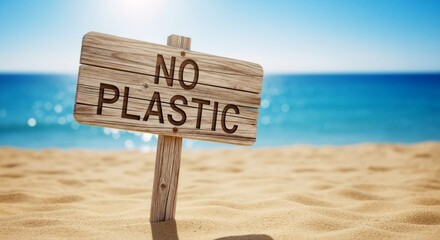 "No Plastic" wooden sign on a sandy beach with blue ocean background. Environmental conservation and zero waste concept. Ecology warning against pollution