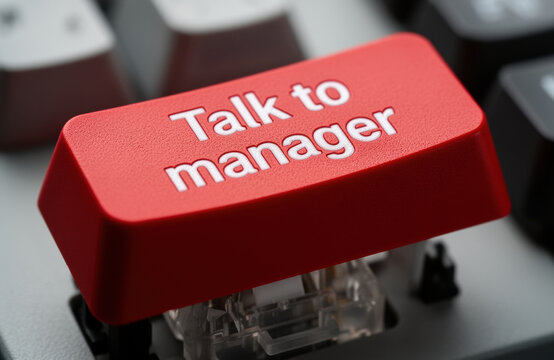 Red key labeled Talk to manager on keyboard representing customer escalation